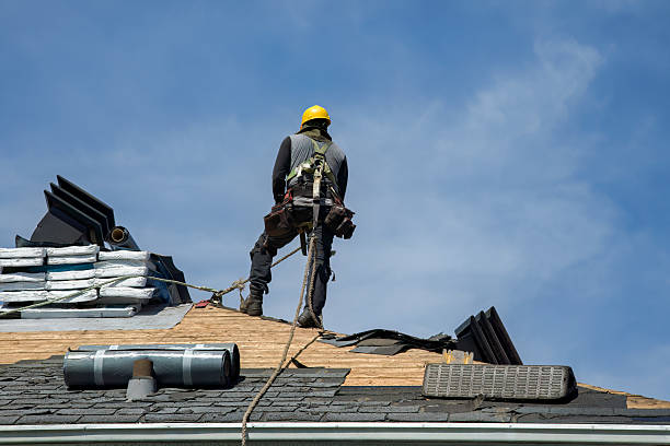 Professional Roof Replacement technician working in Smithfield, RI